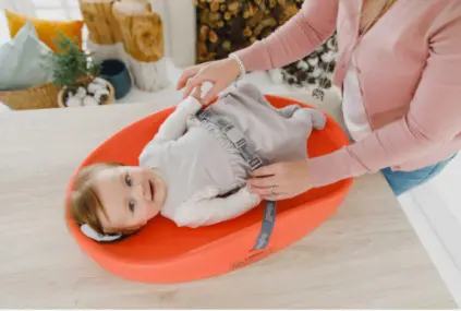 Ergonomically Shaped Soft Changing Pad - Coral 1